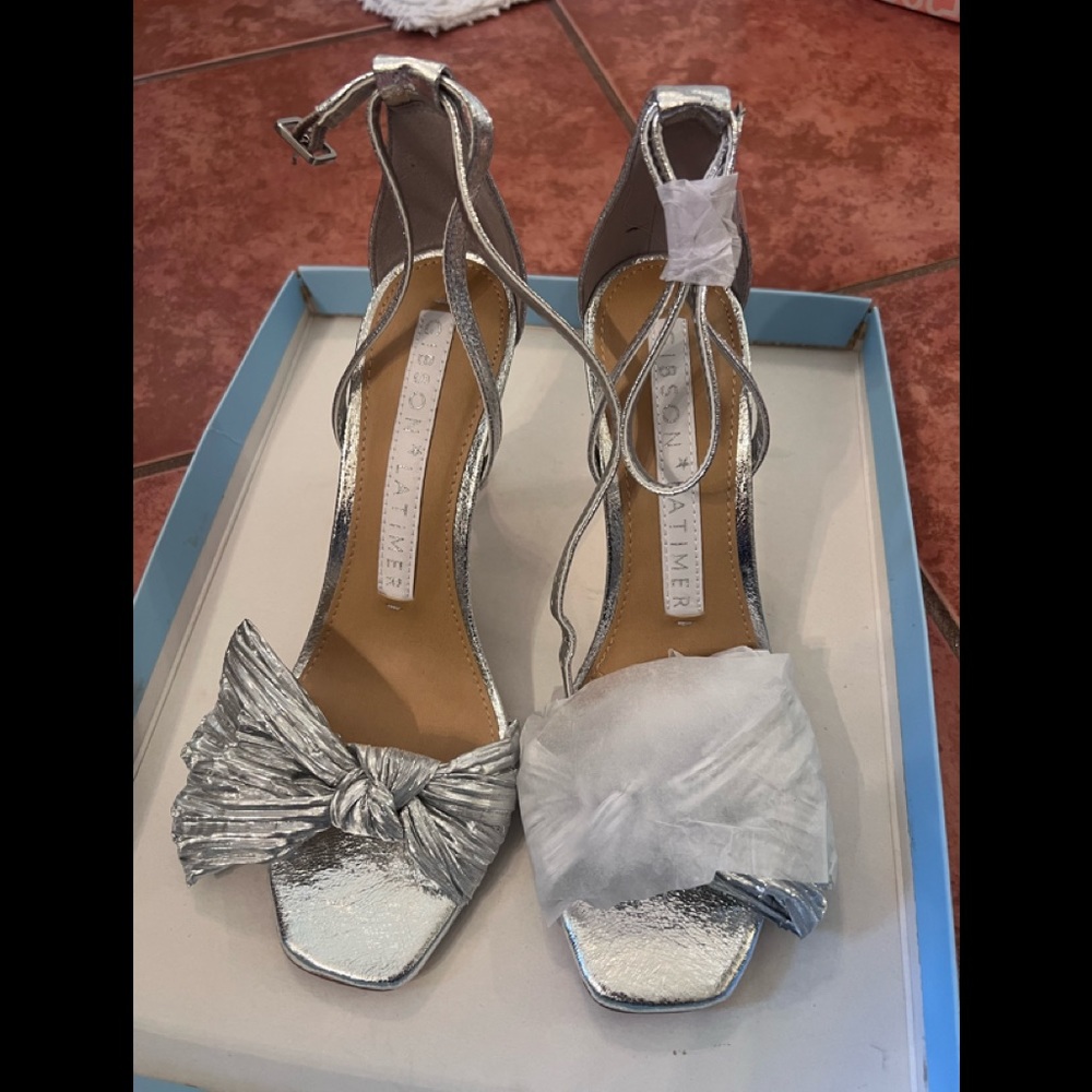 Gibson Latimer, brand new silver heels